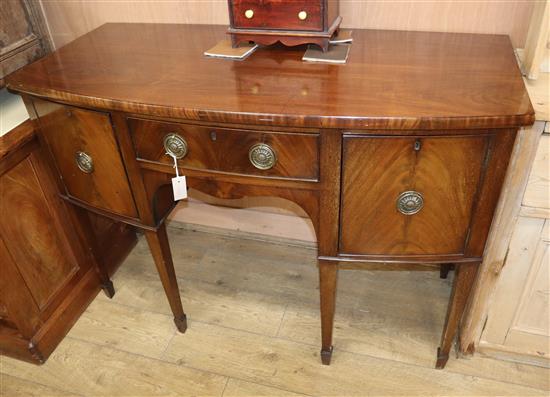 A Georgian style mahogany bowfront sideboard W.130cm